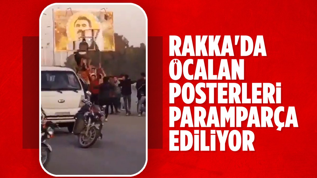 Suriye Rakka’da muhalifler Öcalan posterlerini yırttı